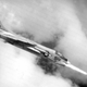 A US Navy F-8D Crusader of Fighter Squadron VF-111 “Sundowners” fires a Zuni rocket over South Vietnam in 1965. (US Navy)